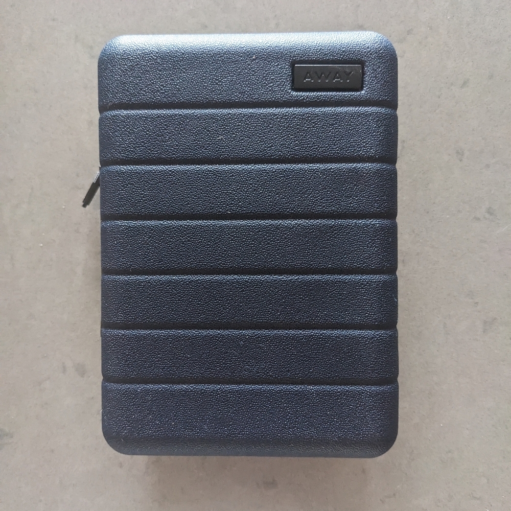 AWAY Mini Hard Case x United Polaris travel case